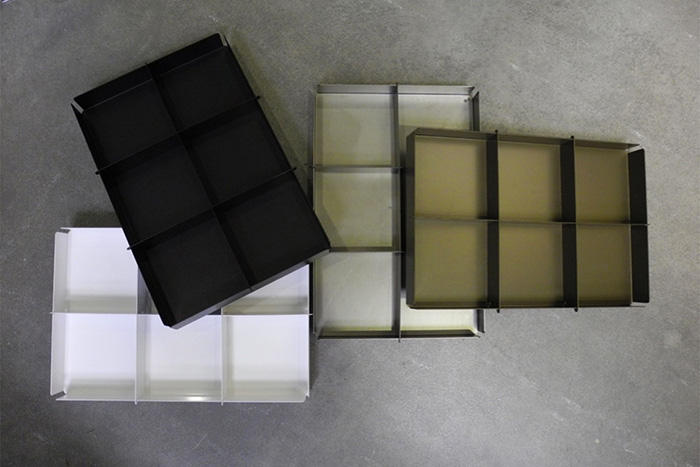 Porta cappelli, cubi, porta borse e porta prezzi